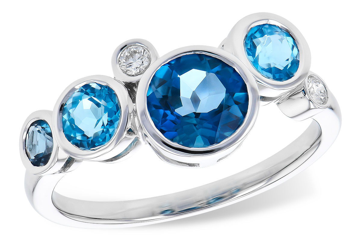 B327-52338: LDS RG 1.40 TW BLUE TOPAZ 1.45 TGW