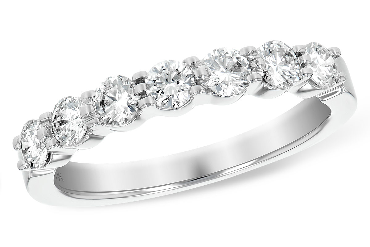 K147-51446: LDS DIA WED RG .75 TW (7 STONES)